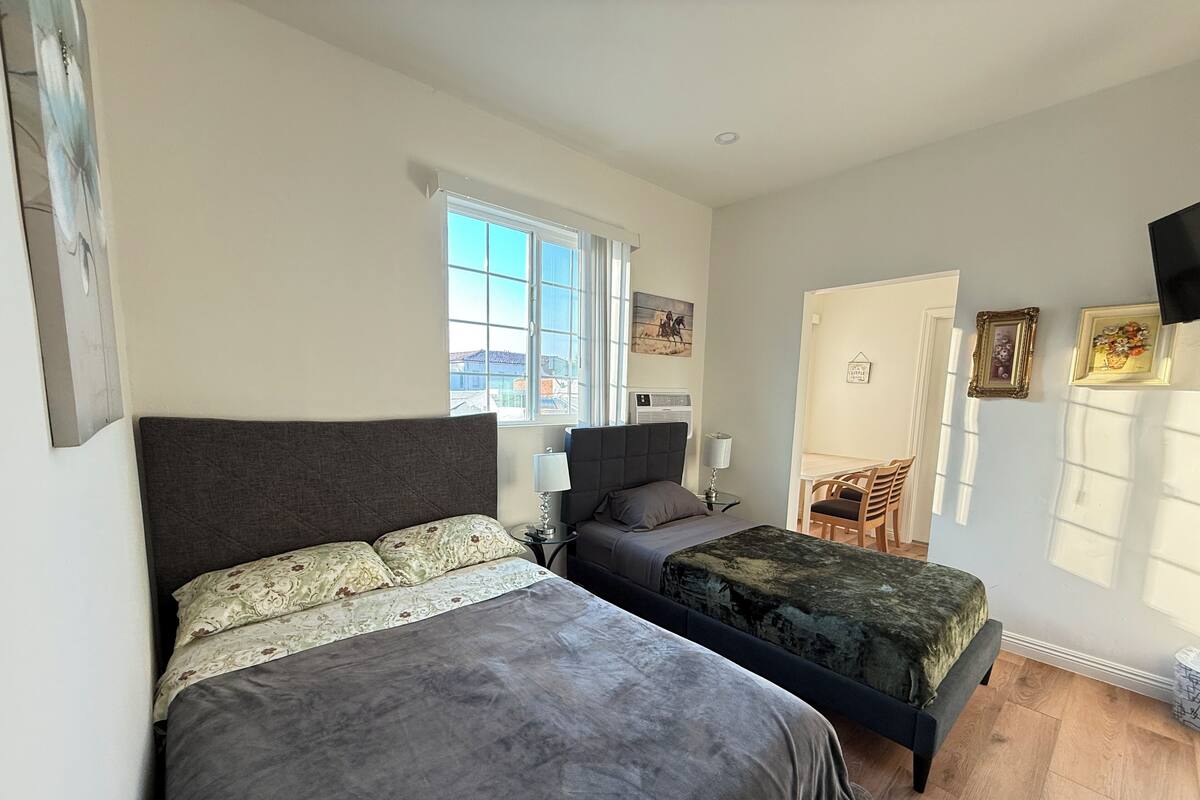 Desk, laptop workspace, blackout drapes, soundproofing