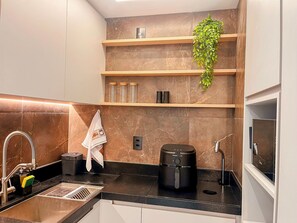 Luxury Apartment | Private kitchen | Fridge, microwave, stovetop, cookware/dishes/utensils