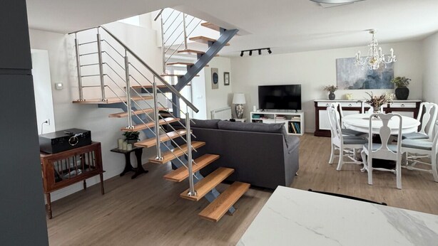 A modern interior with a staircase, a dining area, and a living space. - La Quintana de Pola (Brand-new luxury country retreat in Cudillero) (Cudillero)