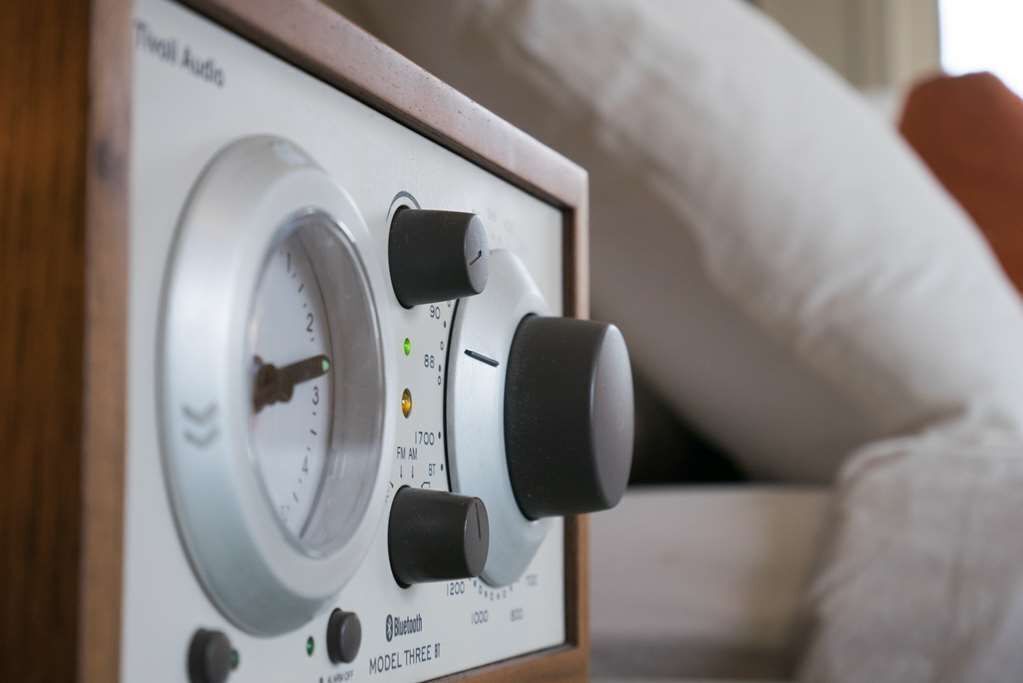 A radio with multiple dials and a Bluetooth symbol, indicating it is a Model Three II.