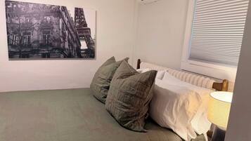 4 bedrooms, iron/ironing board, travel cot, WiFi