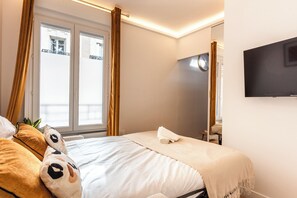 1 slaapkamer, een strijkplank/strijkijzer, internet, beddengoed