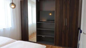 2 quartos, berço de viagem, Wi-Fi de cortesia, roupa de cama