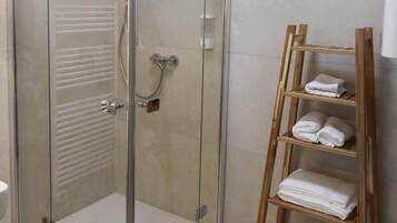Hair dryer, towels, soap, shampoo