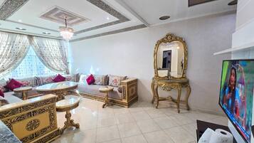 Deluxe Apartment, Balcony, City View | Living area