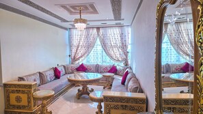 Deluxe Apartment, Balcony, City View | Living area - Abraj Dubai - Luxury LovelyStay (Larache)