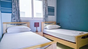 Deluxe Apartment, Balcony, City View | In-room safe, blackout drapes, iron/ironing board (on request) - Abraj Dubai - Luxury LovelyStay (Larache)