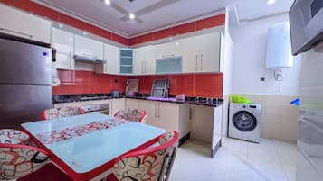 Appartement Deluxe, balcon, vue ville | Cuisine privée
