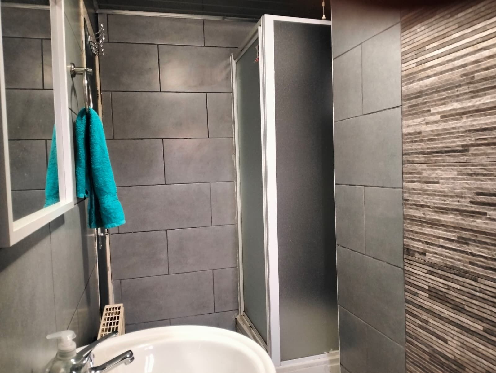 Shower, towels, soap, shampoo