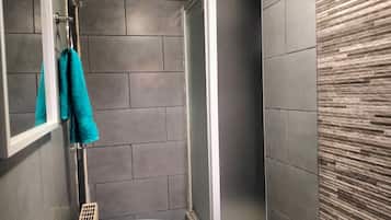 Shower, towels, soap, shampoo
