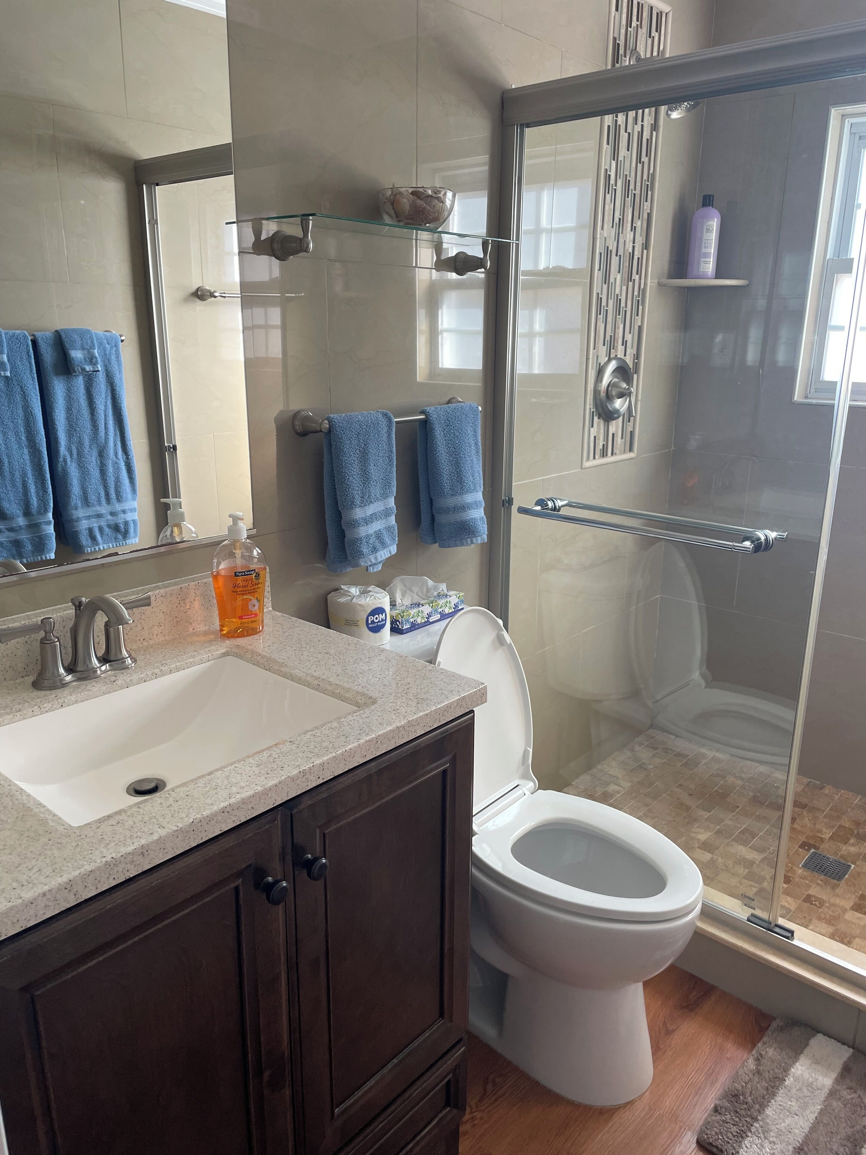 Shower, hair dryer, towels, soap