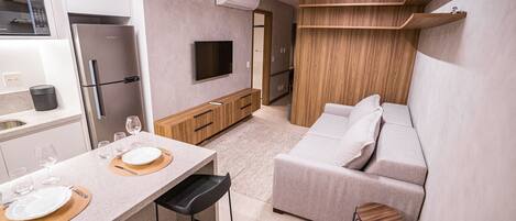 Basic Apartment | Living area | Flat-screen TV