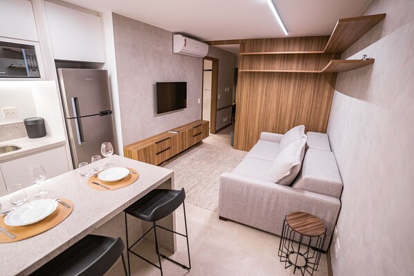 Basic Apartment | Living area | Flat-screen TV - Apartamento novo de alto padrão 223NW (Brasilia)