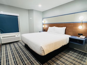 Room, 1 King Bed, Mobility Accessible, Non Smoking (Bathtub w/Grab Bars) | Premium bedding, blackout drapes, iron/ironing board, rollaway beds - Americinn By Wyndham Rawlins (Rawlins)