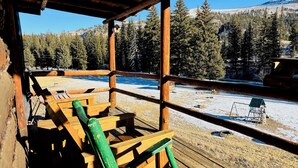 A wooden deck with benches and a view of a snowy landscape with trees and mountains. - Great mountain cabin with river views. Sleeps 4. 15 miles to Wolf Creek Ski area and 3/4 mile private fishing. (South Fork)