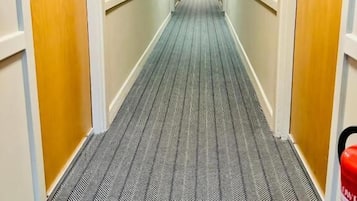 Desk, laptop workspace, iron/ironing board