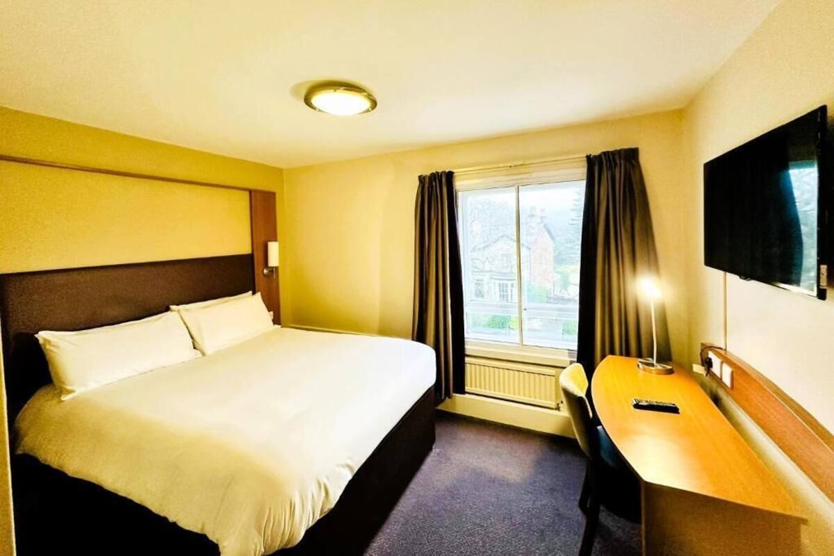 Desk, laptop workspace, iron/ironing board