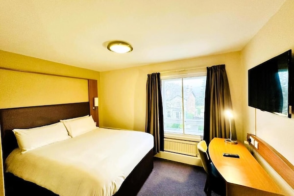 Desk, laptop workspace, iron/ironing board