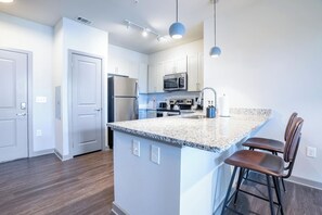 Fridge, microwave, oven, stovetop - Stylish, Comfortable 2BD Abode near DT Matthews (Matthews)