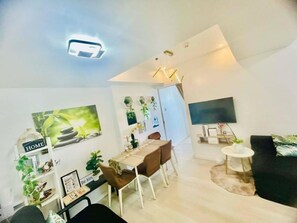 TV - A Cozy Two-Bedroom Escape with Balcony (Paranaque)