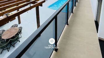 Honeymoon Cabin, Jetted Tub, Pool View | Terrace/patio