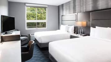 Tabla de planchar con plancha, wifi gratis y ropa de cama