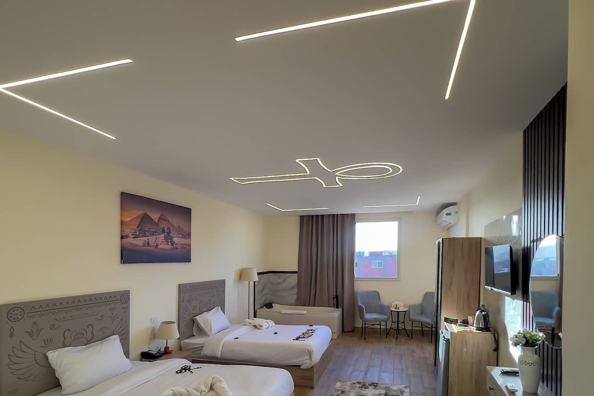 Deluxe Double Room, Hot Tub, Mountain View | In-room safe, desk, laptop workspace, soundproofing