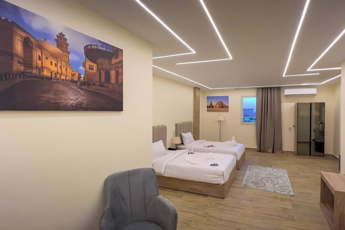 Deluxe Double or Twin Room, City View | In-room safe, desk, laptop workspace, soundproofing