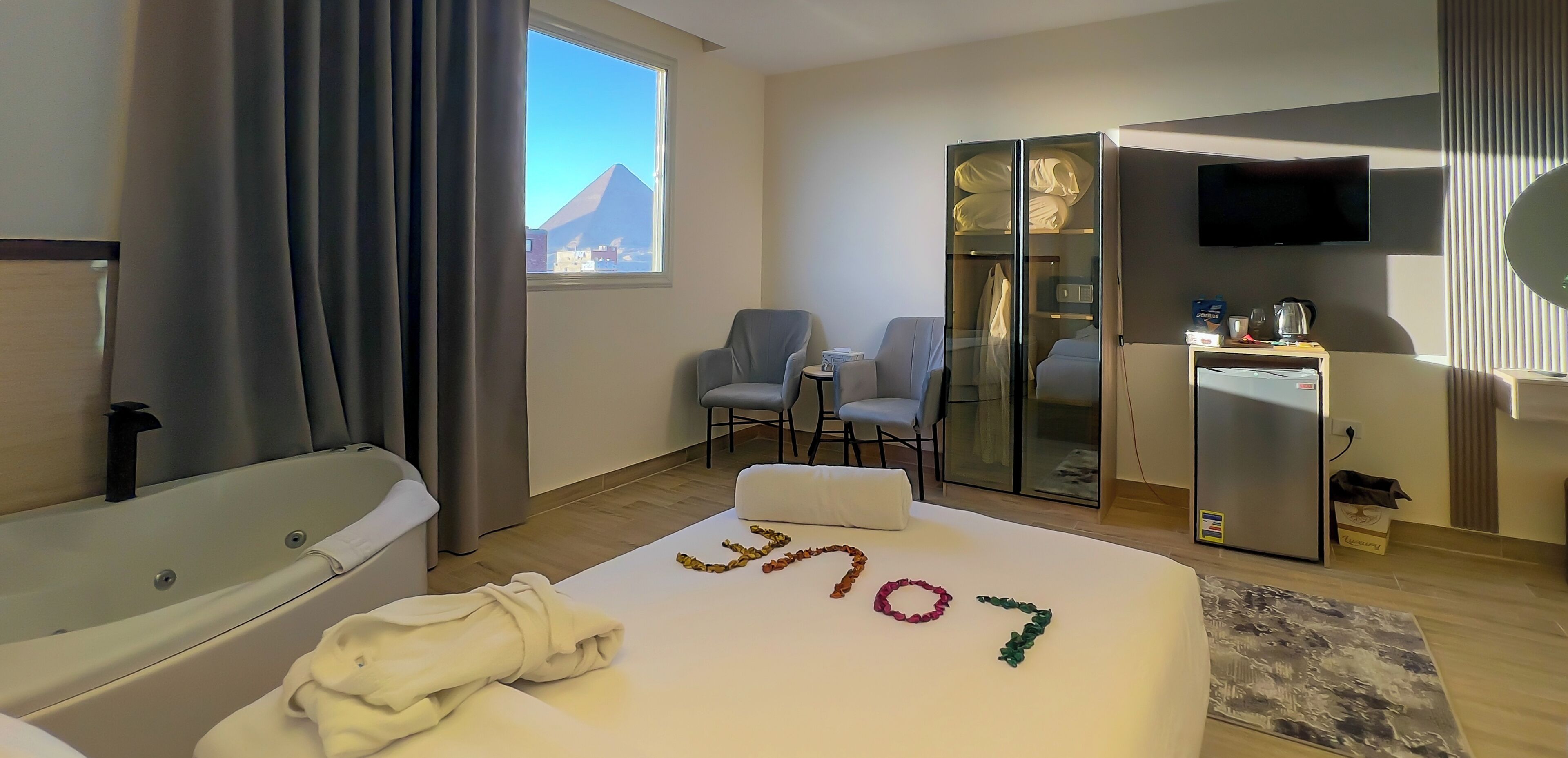 Deluxe Double Room, Hot Tub, Mountain View | In-room safe, desk, laptop workspace, soundproofing