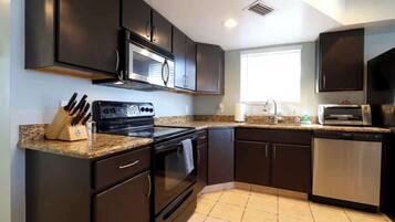 Coffee/tea maker, fridge, microwave, oven