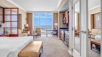 Tabla de planchar con plancha, wifi y ropa de cama