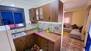 Classic Apartment, Partial Ocean View | Private kitchen | Full-size fridge, oven, stovetop, cookware/dishes/utensils - CENTRICO - Holiday Homes (Larache)