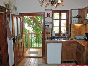 Fridge, microwave, cookware/dishes/utensils