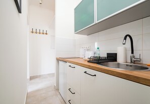 Refrigerador, placa de cocina, tostadora