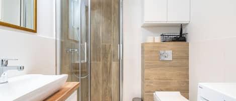Shower, free toiletries, hair dryer, towels