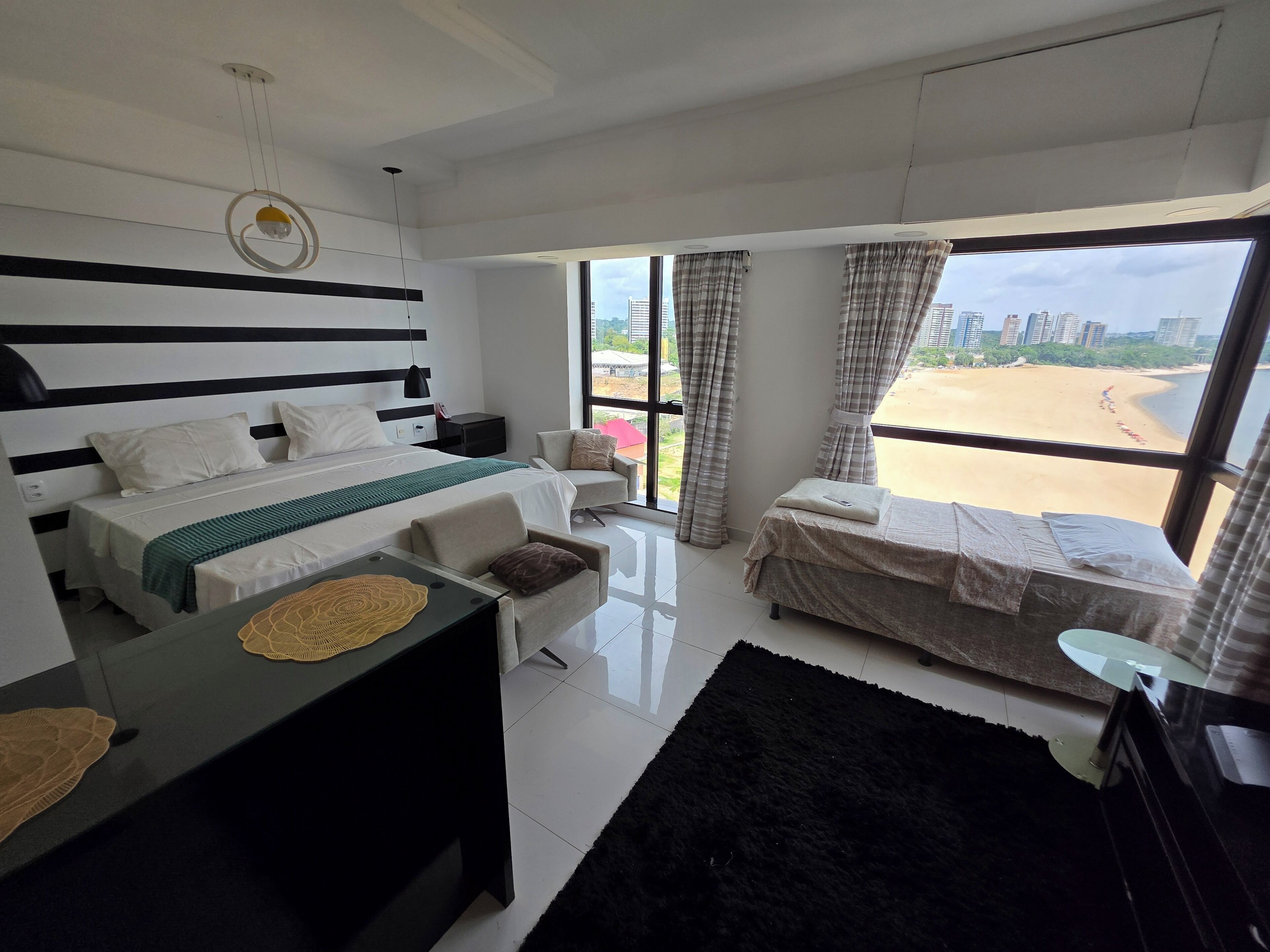 Deluxe Room, Beach View | Hypo-allergenic bedding, soundproofing, free WiFi, bed sheets