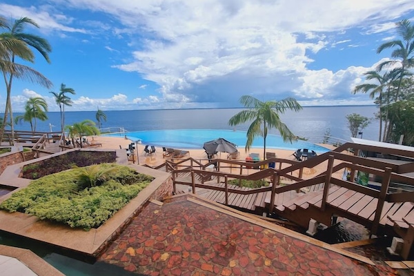 Deluxe Room, Beach View | Terrace/patio