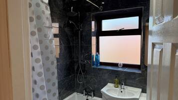 Hair dryer, towels, soap, toilet paper