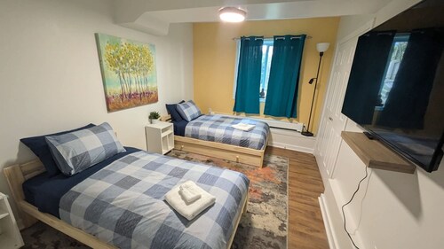 Comfy Apartment: Steps from Downtown Fun