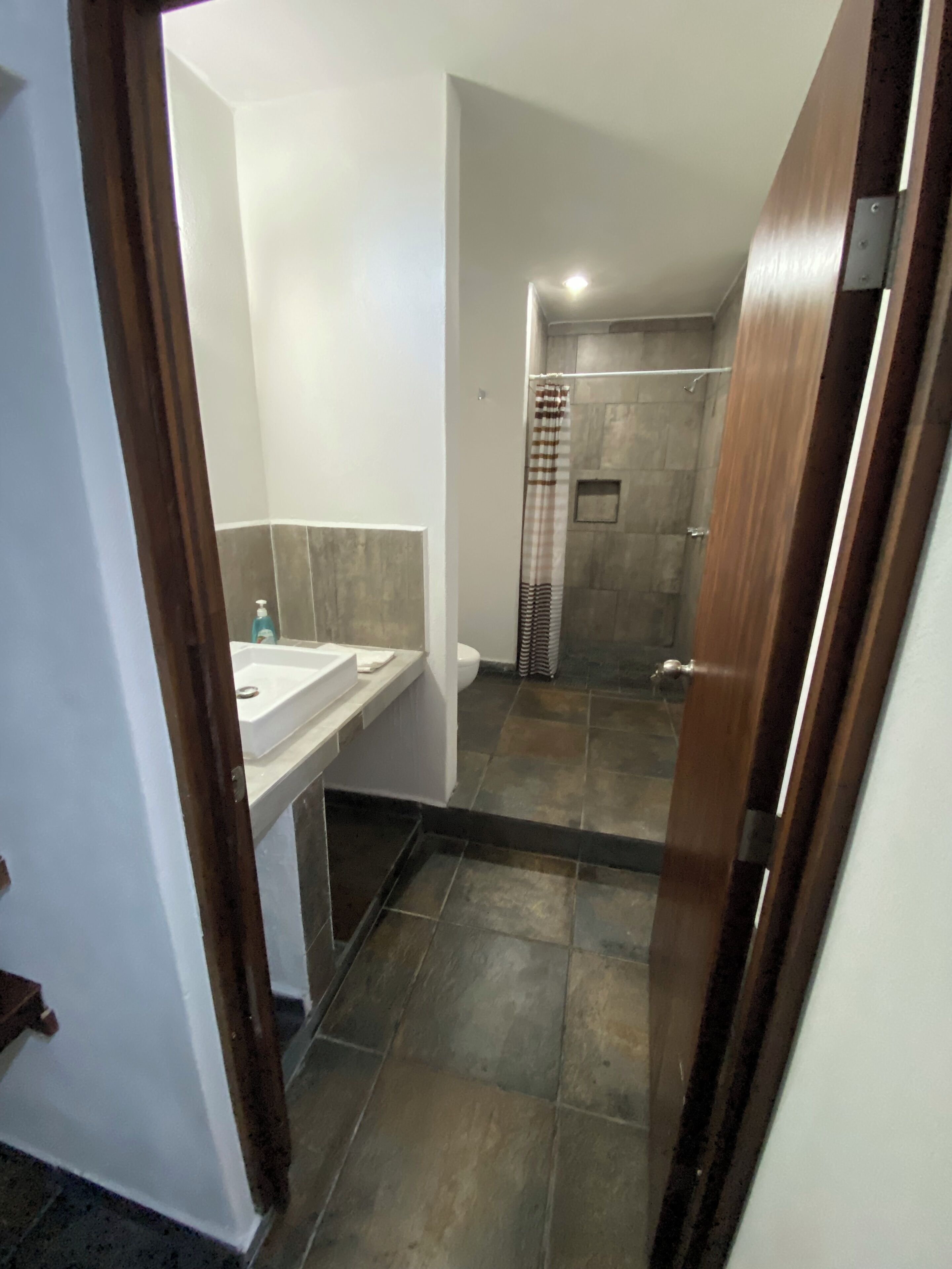 Shower, towels, soap, toilet paper