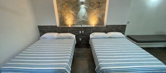 Costa Ayala - Suite 6 with kitchen 2dbl beds and 2 sofas. Near beach area. 