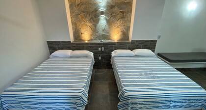 Costa Ayala - Suite 6 with kitchen 2dbl beds and 2 sofas. Near beach area.