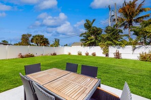 Outdoor dining - 3BR/1.5BA Indialantic Duplex: Pet-Friendly Fenced Yard, Walk to Beach, Wet Bar & Private Balcony (Melbourne)