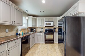 Fridge, microwave, oven, stovetop - 3BR/1.5BA Indialantic Duplex: Pet-Friendly Fenced Yard, Walk to Beach, Wet Bar & Private Balcony (Melbourne)