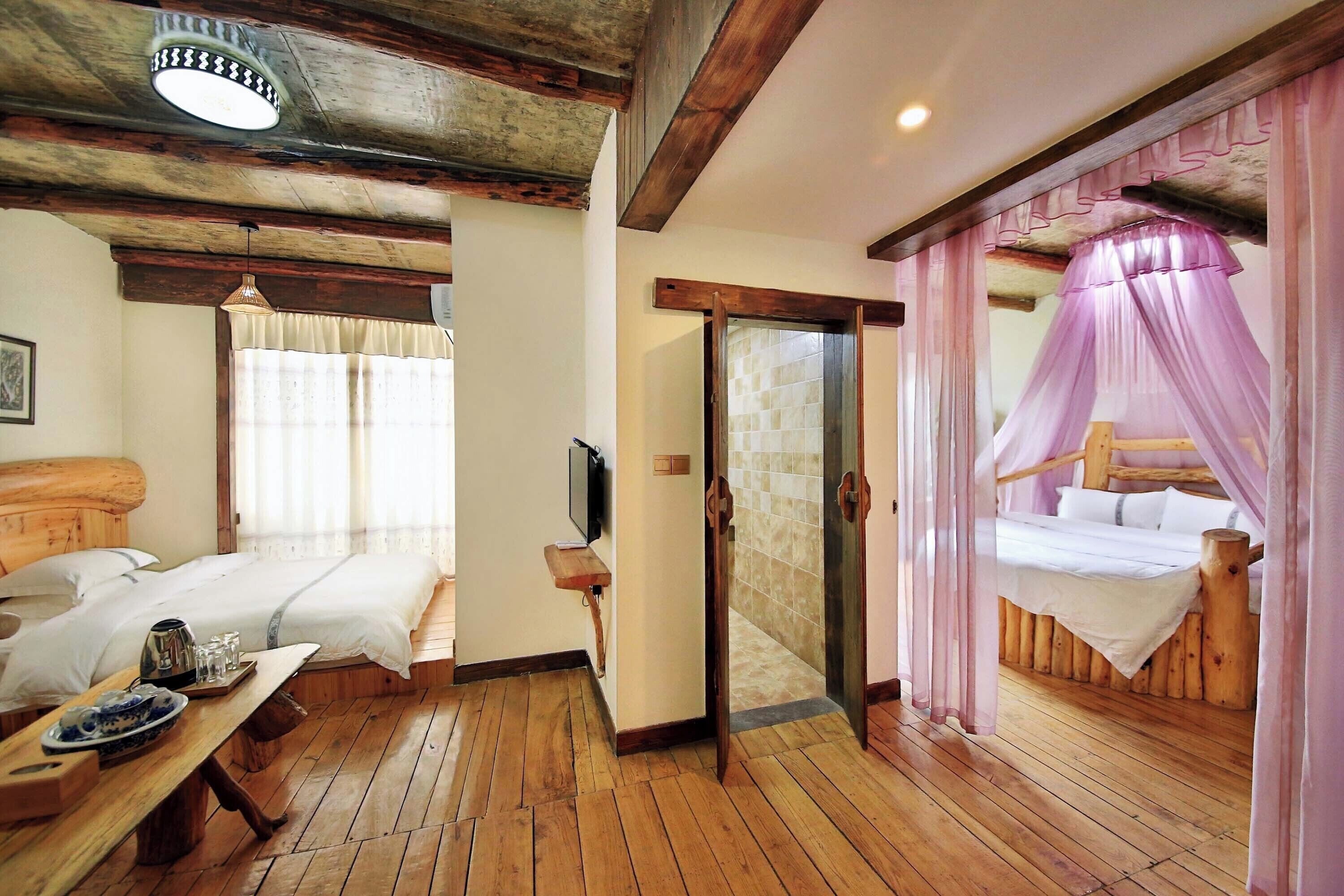 Deluxe Suite, Mountain View | Desk, laptop workspace, blackout drapes, free WiFi