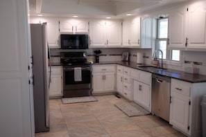 Fridge, microwave, oven, stovetop - Comfortable Home Near CoxHealth & MSU - Fenced Yard (Springfield)