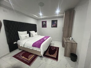 1 غرفة نوم ومكواة/لوح كي وواي فاي وملاءات أسرّة