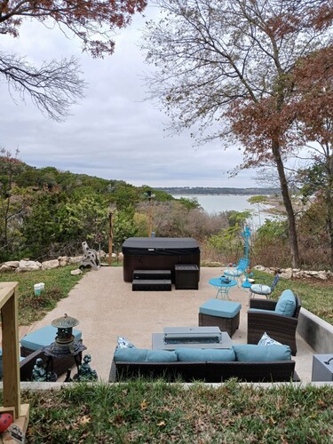 New Listing with lake view, great outdoor space and special rates for 2025