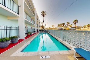 Pool - Gulf-front condo with on-site beach access, patio, central AC & full kitchen (South Padre Island)