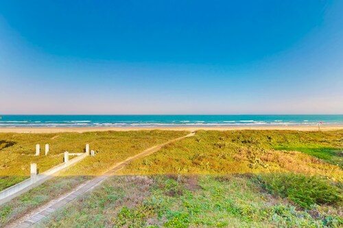 Gulf-front condo with on-site beach access, patio, central AC & full kitchen